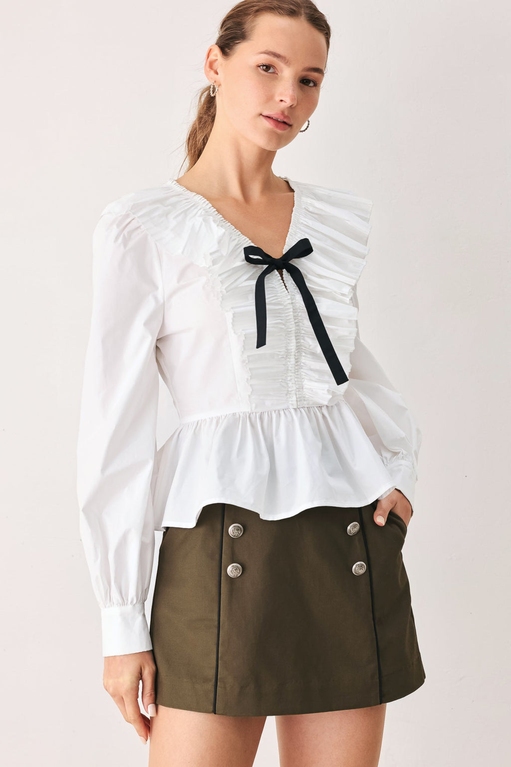 AMELIE PLEATED RUFFLE V-NECK WOVEN TOP